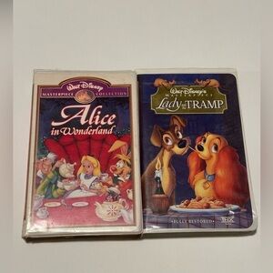 A Set of 2 Walt Disney Movies - Lady and the Tramp and Alice in Wonderland